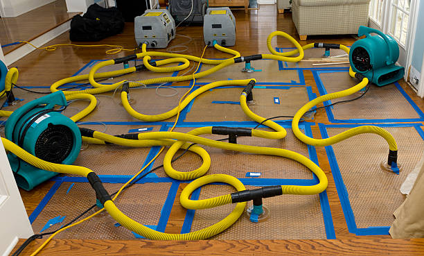 Professional Flood Damage Restoration technician working in Indiahoma, OK